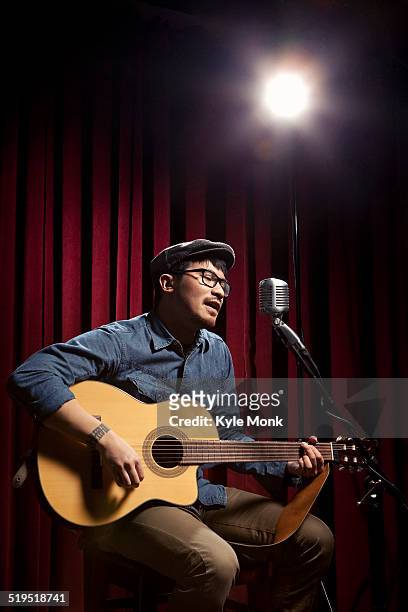korean singer performing on stage - guitarist stock pictures, royalty-free photos & images