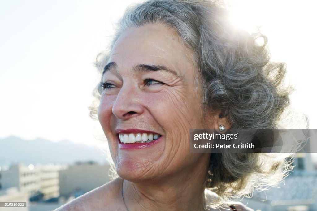 Caucasian woman smiling outdoors