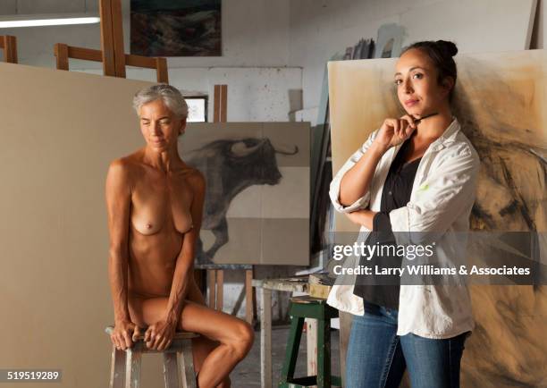 nude older woman modeling for artist in studio - life drawing model stock pictures, royalty-free photos & images