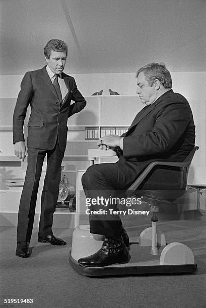 Canadian-American actor Raymond Burr testing the Chairmobile, a battery-powered mobility aid for the disabled, designed by Antony Armstrong-Jones,...