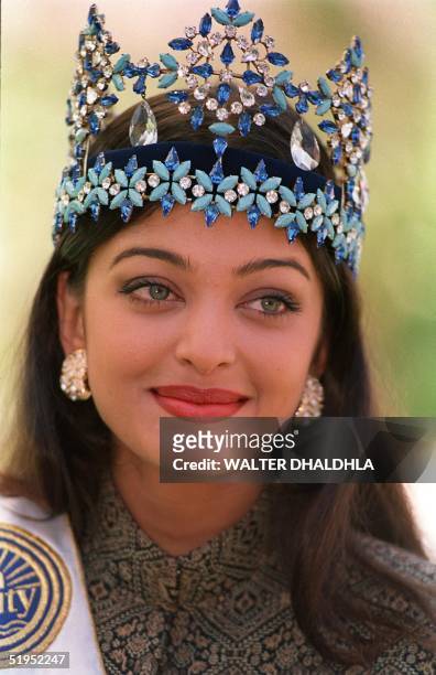 Miss World 1994 Aishwarya Rai of India poses for photographers a day after winning her crown in Sun City, 20 November 1994.