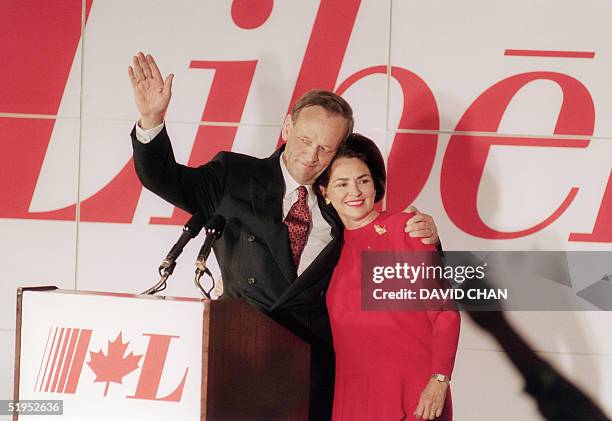 Canada Prime Minister designate Jean Chretien and his Aline wife acknowledge supporters, 25 October 1993, at the Liberal Party's headquarters in...