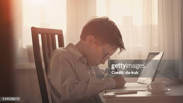 cute boy making his homework - algebra stock pictures, royalty-free photos & images