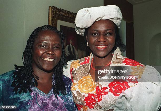 Kenyan militant ecologist Wangari Maathai and Maryam Ibrahim Babangida of Nigeria pose for a photograph at a reception in London, 19 September 1991,...