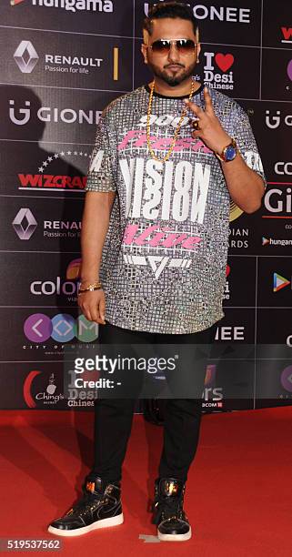 Indian Bollywood playback singer Honey Singh attends the Global Indian Music Academy awards ceremony in Mumbai on April 6, 2016. / AFP / -