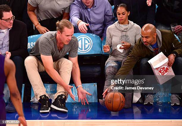 New York Mets player Noah Syndergaard attends the Charlotte Bobcats vs New York Knicks game at Madison Square Garden on April 6, 2016 in New York...