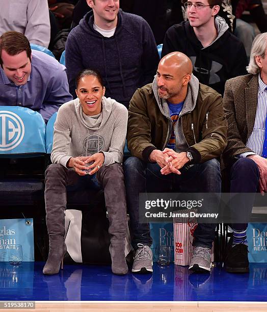 Misty Copeland and Olu Evans attend the Charlotte Bobcats vs New York Knicks game at Madison Square Garden on April 6, 2016 in New York City.