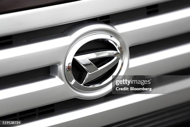 The Daihatsu Motor Co. Badge is displayed on the front of the company's Move Conte vehicle displayed for the media at the Daihatsu Motor Kyushu Co....