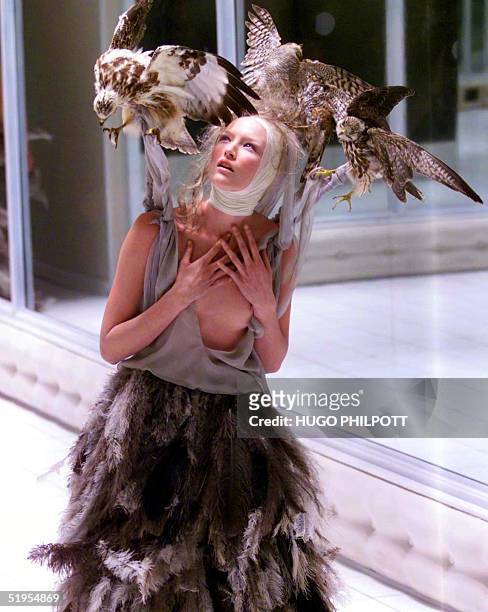Model presents a creation by Alexander Mcqueen for the Spring/Summer collection at London fashion week in London 26 September 2000.