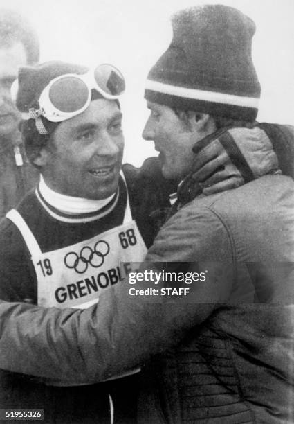 Austrian skier Karl Schranz is congratulated by Frenchman Jean-Claude Killy, following his victory in the slalom 17 February 1968 in Chamrousse, near...