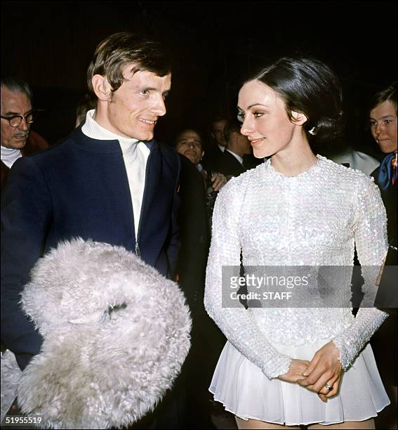 French skier Jean-Claude Killy chats with American ice skater Peggy Fleming 18 February 1968 in Grenoble during the last day of the Winter Olympic...