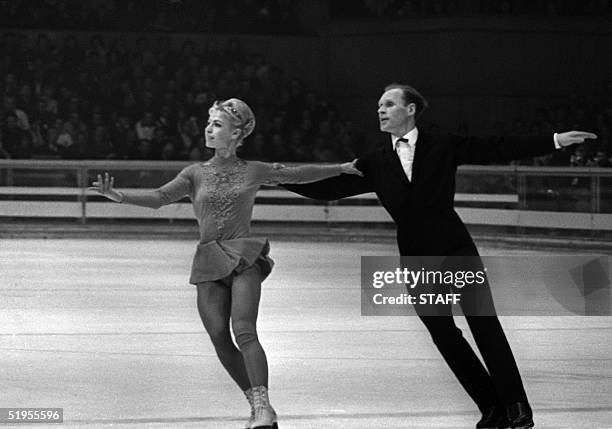 Lyudmila Belousova and her partner Oleg Protopopov from the Soviet Union execute their program during the figure skating pairs competition 14...