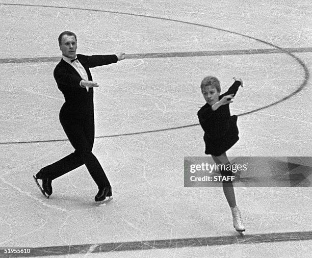 Lyudmila Belousova and her partner Oleg Protopopov from the Soviet Union execute their program during the figure skating pairs competition 29 January...