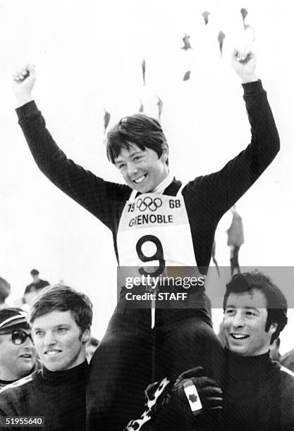 Canadian skier Nancy Greene acknowledges the cheers of the crowd after winning the women's giant slalom 15 February 1968 at the Winter Olympic Games...