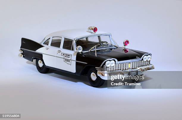 classic american police car model - military chic stock pictures, royalty-free photos & images