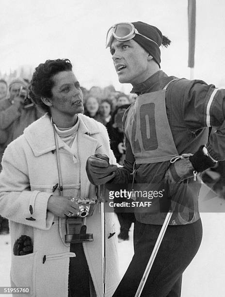 Austrian skier Toni Sailer is surrounded by fans in February 1956 in Cortina d'Ampezzo during the Winter Olympic Games. Sailer won three gold medals...