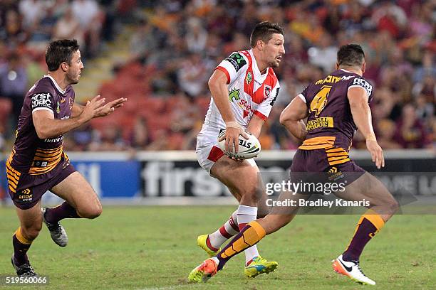 Gareth Widdop of the Dragons looks to pass during the round six NRL match between the Brisbane Broncos and the St George Illawarra Dragons at Suncorp...