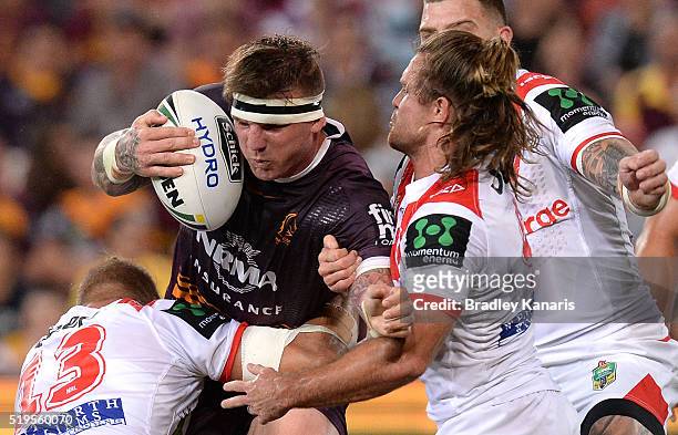 Josh McGuire of the Broncos takes on the defence during the round six NRL match between the Brisbane Broncos and the St George Illawarra Dragons at...