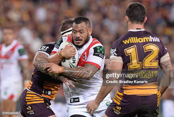 Leeson Ah Mau of the Dragons takes on the defence during the round six NRL match between the Brisbane Broncos and the St George Illawarra Dragons at...