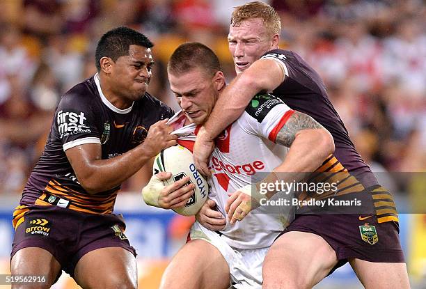 Euan Aitken of the Dragons is tackled during the round six NRL match between the Brisbane Broncos and the St George Illawarra Dragons at Suncorp...