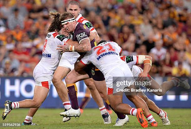 Josh McGuire of the Broncos takes on the defence during the round six NRL match between the Brisbane Broncos and the St George Illawarra Dragons at...