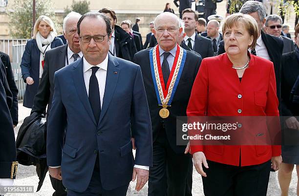 French President Francois Hollande and German Chancellor Angela Merkel arrive to attend the 18th French-German cabinet meeting on April 07, 2016 in...