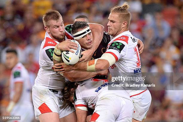 Corey Parker of the Broncos looks to offload during the round six NRL match between the Brisbane Broncos and the St George Illawarra Dragons at...