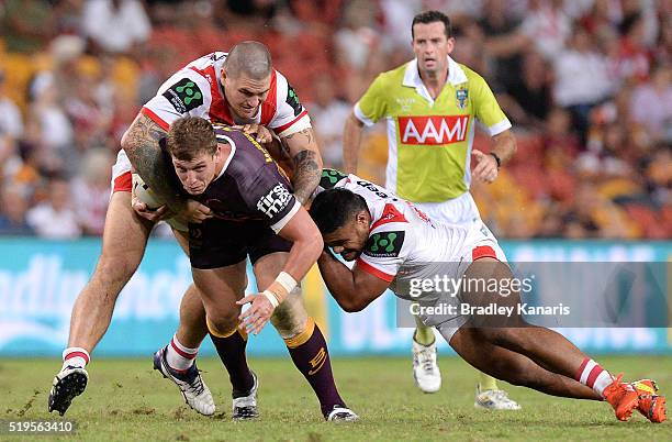 Jarrod Wallace of the Broncos attempts to break through the defence during the round six NRL match between the Brisbane Broncos and the St George...