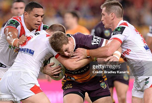 Jarrod Wallace of the Broncos takes on the defence during the round six NRL match between the Brisbane Broncos and the St George Illawarra Dragons at...