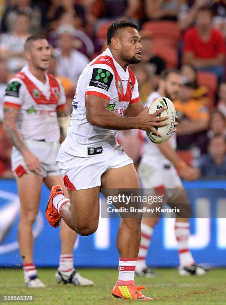 Dunamis Lui of the Dragons runs with the ball during the round six NRL match between the Brisbane Broncos and the St George Illawarra Dragons at...