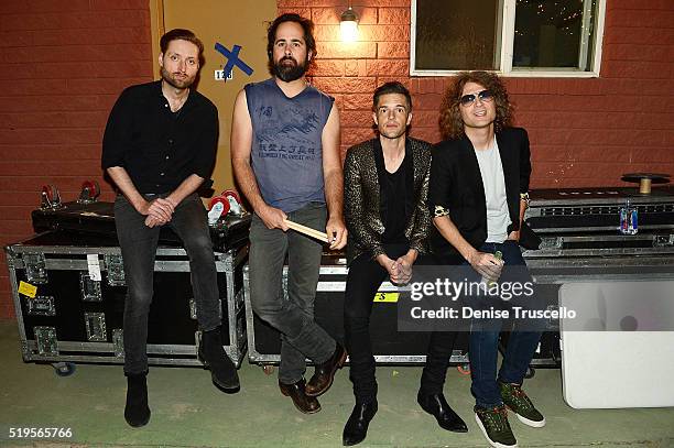 The Killers bass guitarist Mark Stoermer, drummer Ronnie Vannucci Jr., singer Brandon Flowers and guitarist Dave Keuning pose at Bunkhouse on April...
