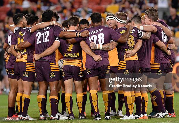 Broncos players embrace before the round six NRL match between the Brisbane Broncos and the St George Illawarra Dragons at Suncorp Stadium on April...