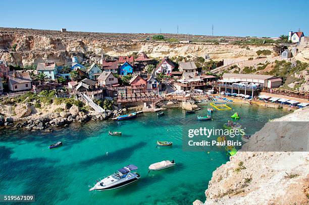 sweethaven village, popeye village anchor bay - mellieha malta stock pictures, royalty-free photos & images