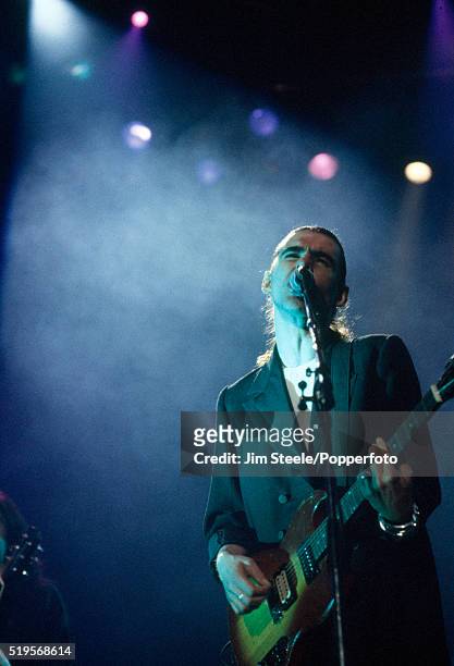 Justin Sullivan of New Model Army performing on stage at the Wembley Arena in London on the 19th January, 1991.