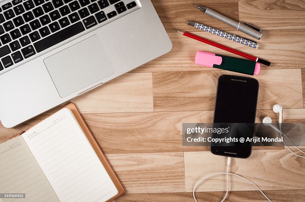 Laptop, Phone And Other Office Stuff On Table Stock Photo, Picture