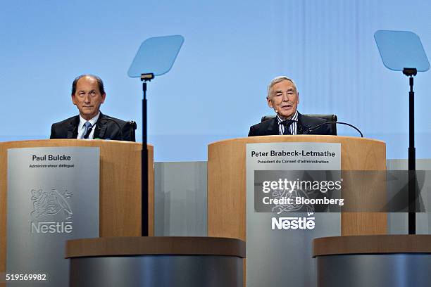 Paul Bulcke, chief executive officer of Nestle SA, left, looks on as Peter Brabeck-Letmathe, chairman of Nestle SA, speaks during the company's...