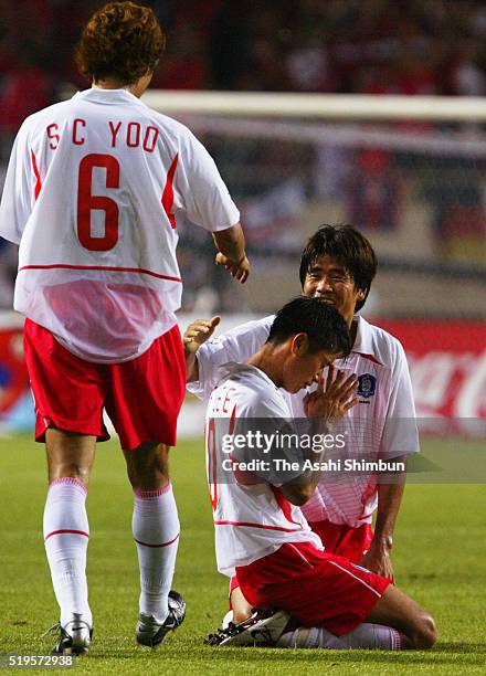 Lee Young-Pyo , Yoo Sang-Chul and Seol Ki-Hyeon of South Korea celebrate winning the FIFA World Cup Korea/Japan Group D match between Portugal and...