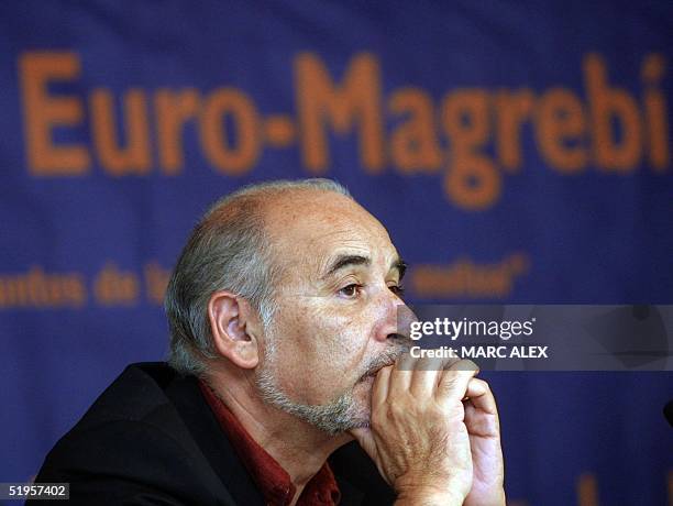 Morrocan writer Tahar Ben Jelloun ponders a question during a press conference 04 October 2001 in Madrid. Some 20 intellectuals from the Magrheb and...
