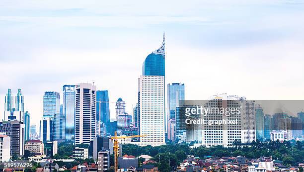 elevated view of jakarta's skyline - jakarta stock pictures, royalty-free photos & images