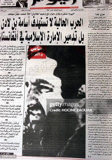 Picture taken 28 October 2001 in Algiers shows the Algerian daily El Youm, with on its frontpage a picture presented by the newspaper as a portrait...