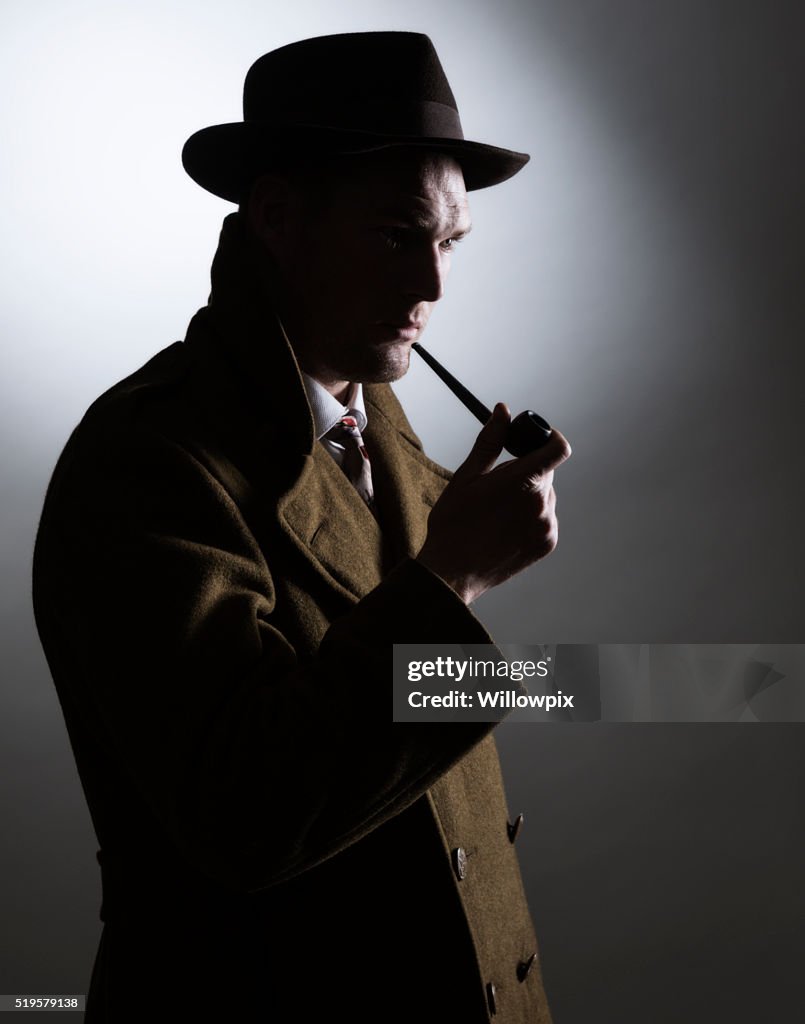 Dark Silhouette 1940s Gumshoe Private Eye Detective Holding Smoking Pipe