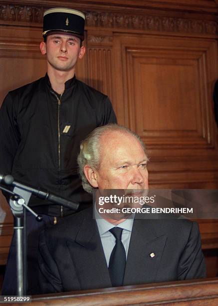 Exiled Italian Crown Prince Victor Emmanuel of Savoy sits 13 November 1991 in the prisoners dock at Paris Criminal Court, where he faces manslaughter...