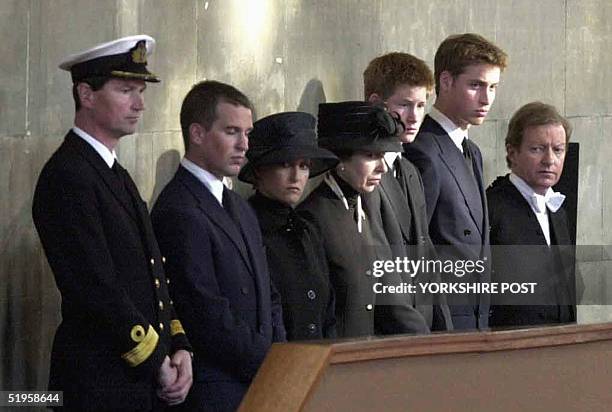 Commodore Tim Laurence, Peter Phillips, the Countess of Wessex, the Princess Royal, Prince Harry, Prince Willam and an official watch over the...