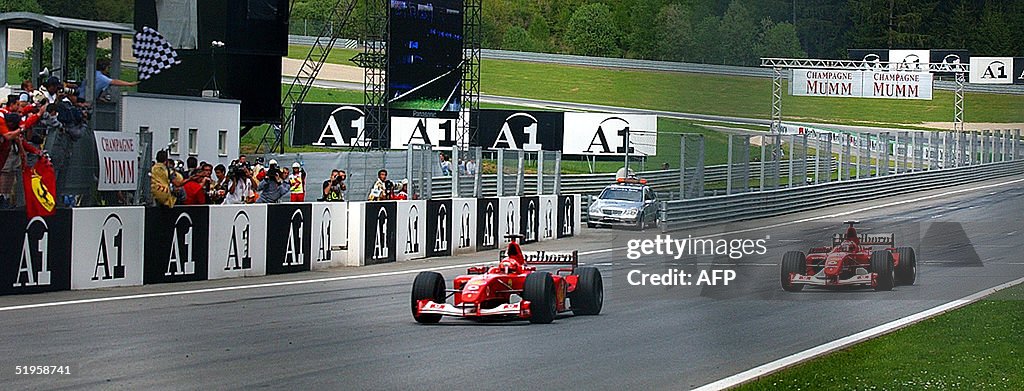 German Ferrari driver Michael Schumacher crosses t