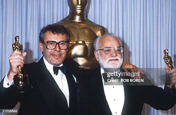 Milos Forman , Czechoslovakian-born US filmmaker and Saul Zaentz, respectively director and producer of "Amadeus", a movie based on the life of...