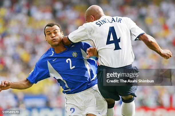 Trevor Sinclair of England and Cafu of Brazil compete for the ball during the FIFA World Cup Korea/Japan quarter final match between England and...