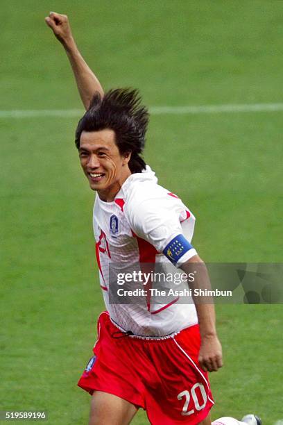 Hong Myung-bo of South Korea celebrates his team's win through the penalty shootout during the FIFA World Cup Korea/Japan quarter final match between...