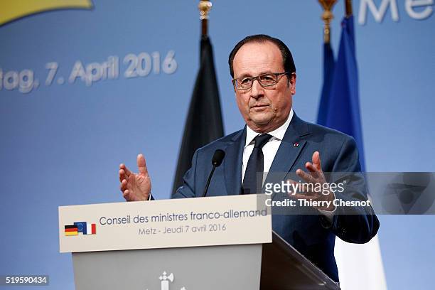 French President Francois Hollande delivers a speech during a press conference after the 18th Franco-German cabinet meeting on April 07, 2016 in...