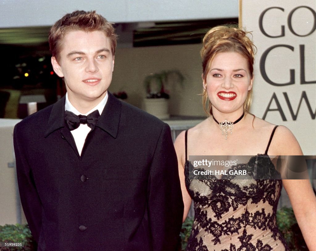 Actor Leonardo DiCaprio (L) arrives with actress a