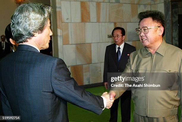 Japanese Prime Minister Junichiro Koizumi and North Korean leader Kim Jong-il prior to their meeting at the Pakhuawon guest house on September 17,...